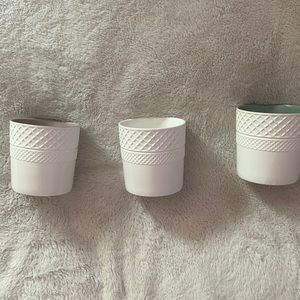 Set of 3 white pots with various interiors